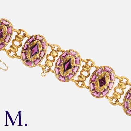 Bracelet ancien en or jaune 18 carats, serti de gr