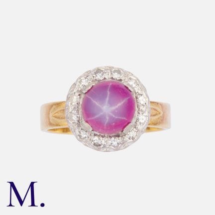 Bague à rubis étoilé et diamants en or 18 carats e