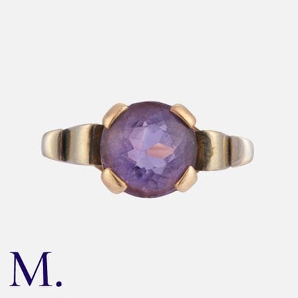 Bague en améthyste en or jaune et blanc, sertie d'