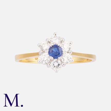 Bague en or jaune 18 carats sertie d'un saphir et 