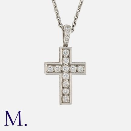 CARTIER, collier avec pendentif en forme de crucif