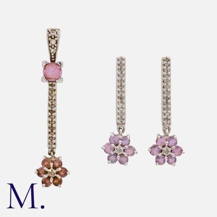 Ensemble composé d'un pendentif et de boucles d'or