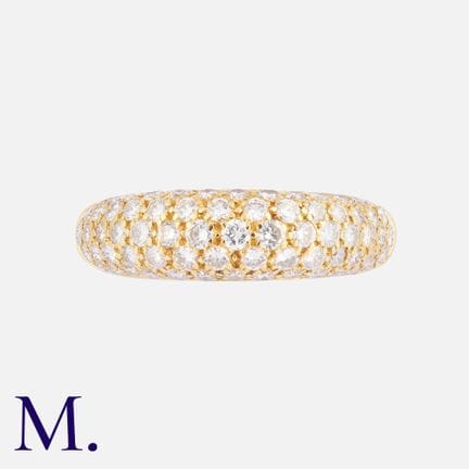 Bague bombée sertie de diamants en or jaune 18 car