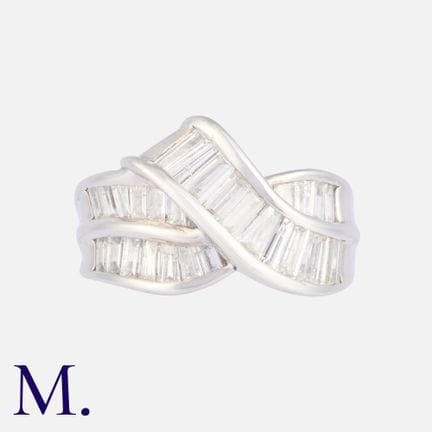 Bague en platine sertie d'un diamant taille baguet