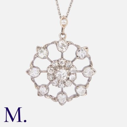 Pendentif / broche en or et argent orné de diamant