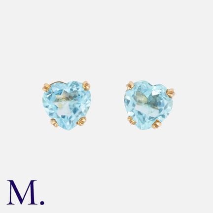 Une paire de boucles d'oreilles en topaze en or ja
