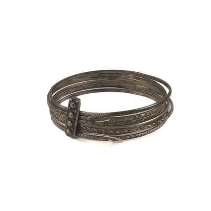 Pulsera semanal de plata compuesta por siete varil