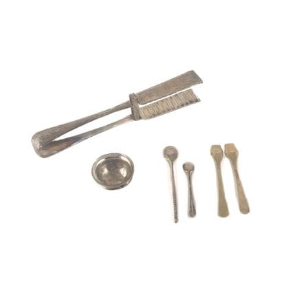 Pinza para espárragos de metal plateado con decora