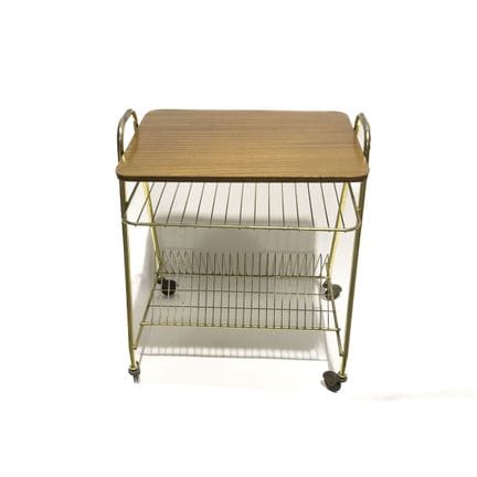 Mensola portariviste in ottone e formica 
Anni '60