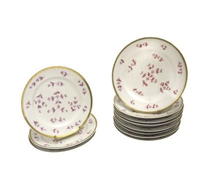 BAYEUX 
11 white porcelain plates, decorated with 