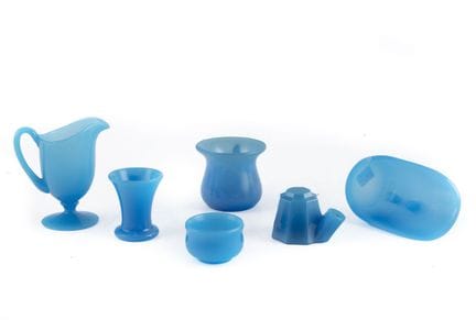 Set of small blue opaline objects, including a pit