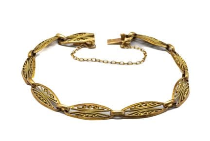 Bracelet en or jaune 18 K (750/1000) à motifs de n