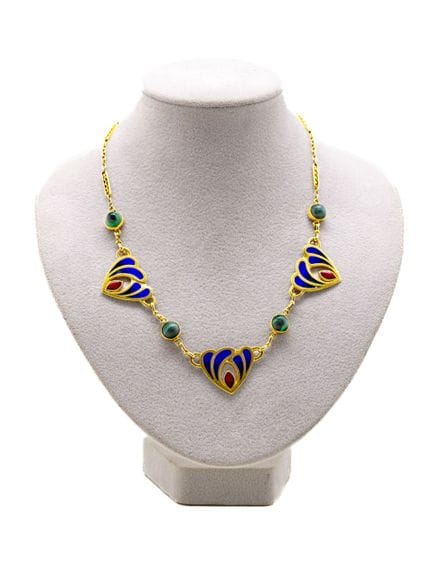 Collier en or jaune 18 K (750/1000) à décor de tro