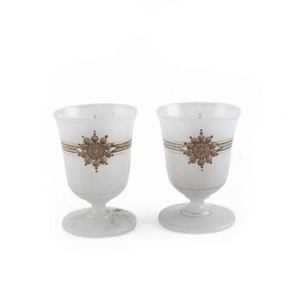 Pair of white opaline stemmed glasses with painted