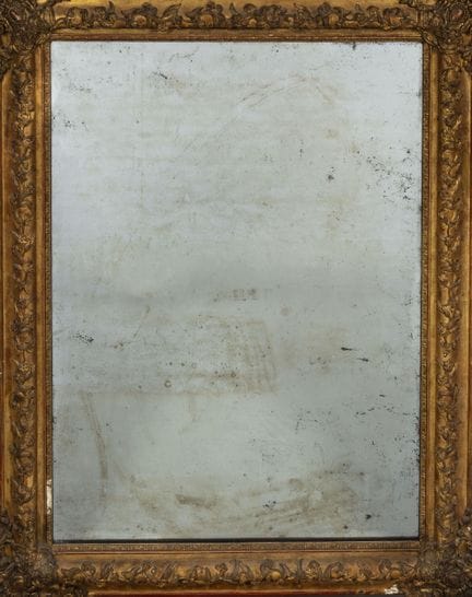 Wooden mirror with gilded stucco, featuring molded