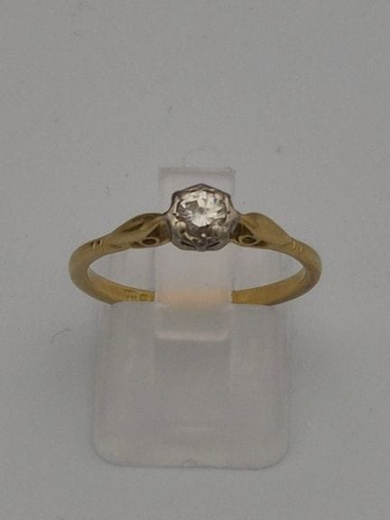 Bague en or jaune 18 carats avec solitaire à couro