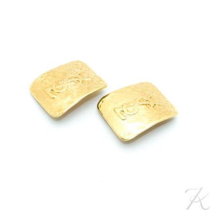 Orecchini YSL con logo dorato di Robert Goossens, 