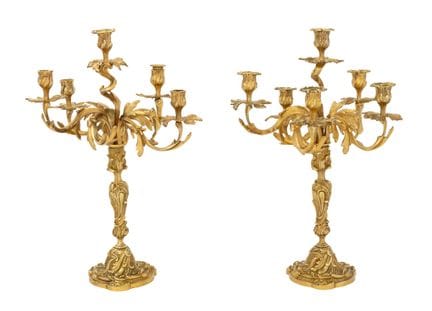 Candelabros de seis brazos de bronce dorado al est