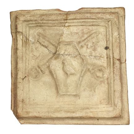 17TH-CENTURY TERRACOTTA PLAQUE WITH HERALDIC COAT 