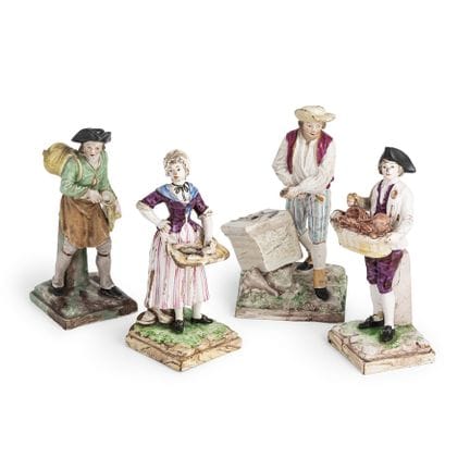 QUATRE FIGURINES EN MAJOLIQUE POLYCHROME, FABRIQUÉ