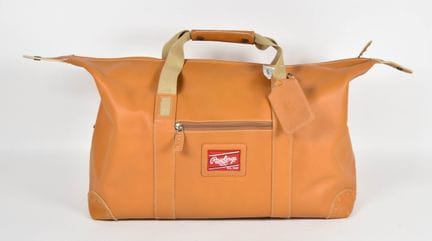 Bolsa de viaje tipo duffel de cuero color camel de