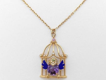 Collier vintage Cartier avec pendentif « cage à pe