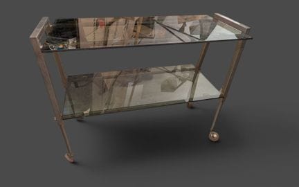 Table servante
En métal chromé et plateaux en verr