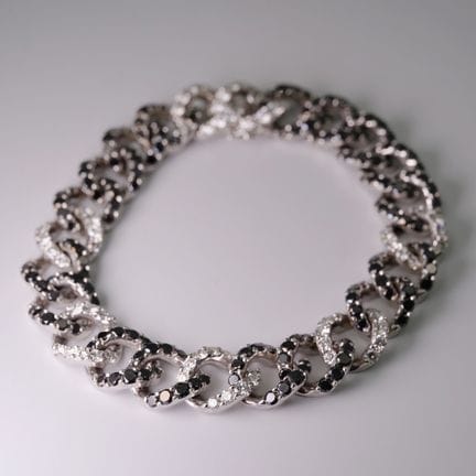 WEMPE. Bracciale a maglia corazzata. Oro bianco 75