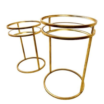 一套渐变式镀金金属与镜面玻璃圆形边桌
60 x 38 x 38
