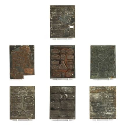 UNA COLECCIÓN DE SIETE BLOQUES DE IMPRESIÓN BRITÁN