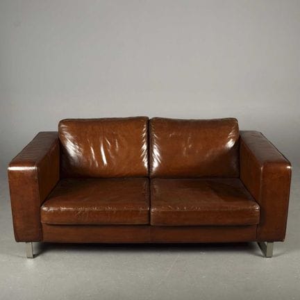CONTEMPORARY TAN LEATHER SOFA 
aluminium supports,