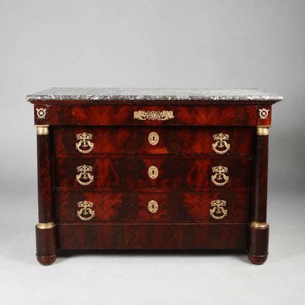 FRENCH EMPIRE COMMODE 
circa 1810, mahogany and br