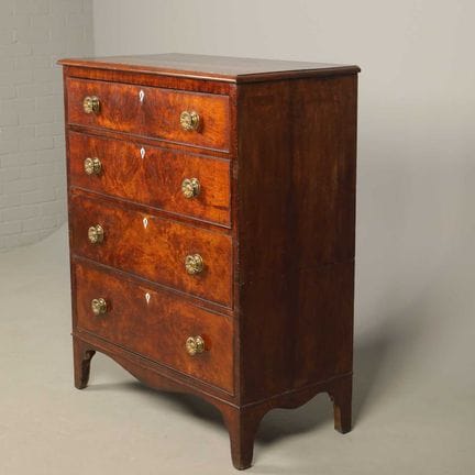 LATE GEORGIAN BURR OAK CHEST 
four drawers, with b