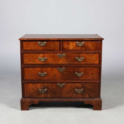 GEORGE II WALNUT AND PINE CHEST 
five drawers and 