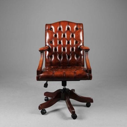 TAN LEATHER DESK CHAIR 
with height adjustable swi