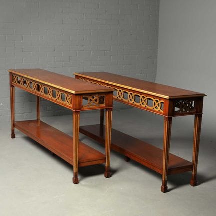 CONSOLE TABLES, A PAIR 
gilt accents, each 79.5cm 
