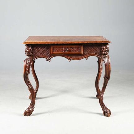 19TH CENTURY OAK AND ELM CENTRE WRITING TABLE 
sin