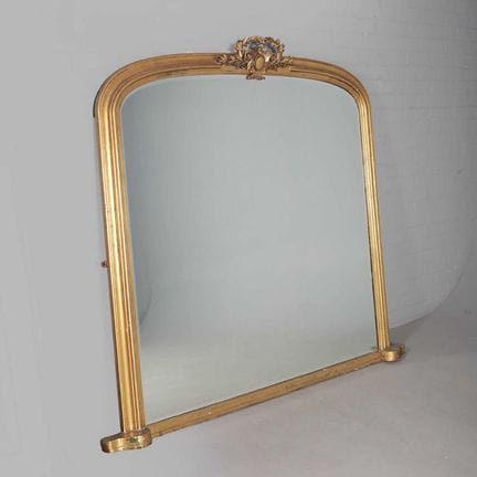 VICTORIAN GILTWOOD OVERMANTEL 
bevelled plate and 
