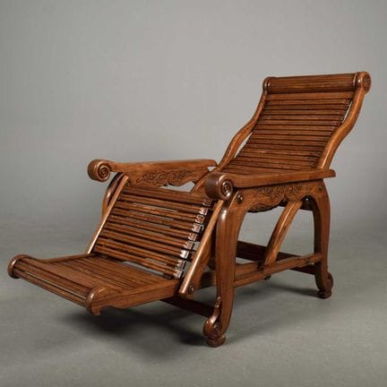 CHINESE RECLINING ARMCHAIR 
Elm with adjustable ba