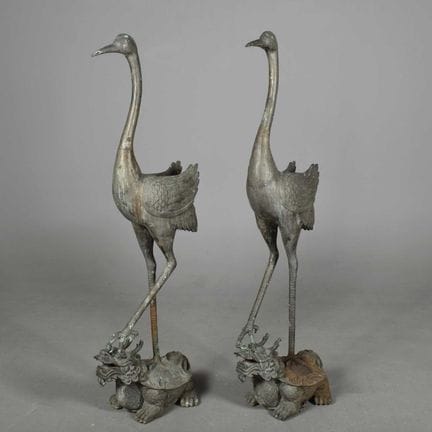 CAST BRONZE STUDIES OF CRANES ON TURTLES (2) 
A pa