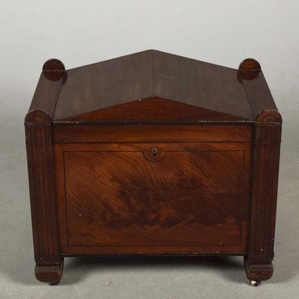 REGENCY MAHOGANY AND EBONISED STRING WINE COOLER 
