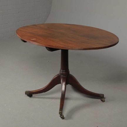GEORGE III MAHOGANY BREAKFAST TABLE 
oval tilt top