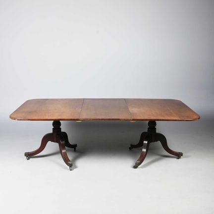 REGENCY MAHOGANY DINING TABLE 
circa 1810, with ti