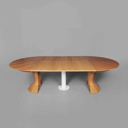 BAULINE OPERA EXTENDING DINING TABLE 
In oak, with