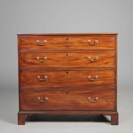GEORGE III MAHOGANY CHEST 
Four long drawers, 101c