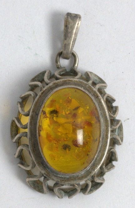 835 sterling silver pendant set with amber.