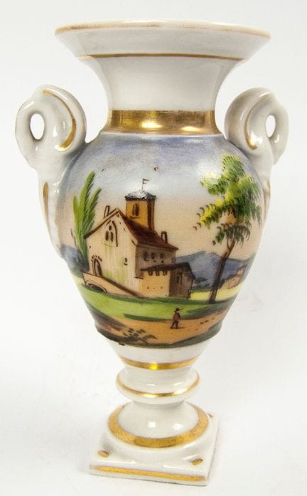 Antique, hand-painted porcelain vase featuring a d