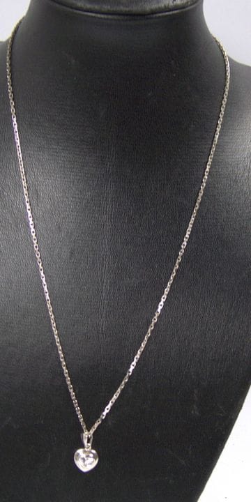 Silver necklace with a pendant set with rock cryst