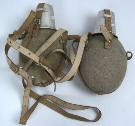 Two military canteens made of aluminum with felt c