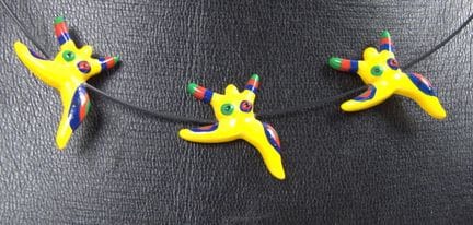 Nana Figurine Necklace.